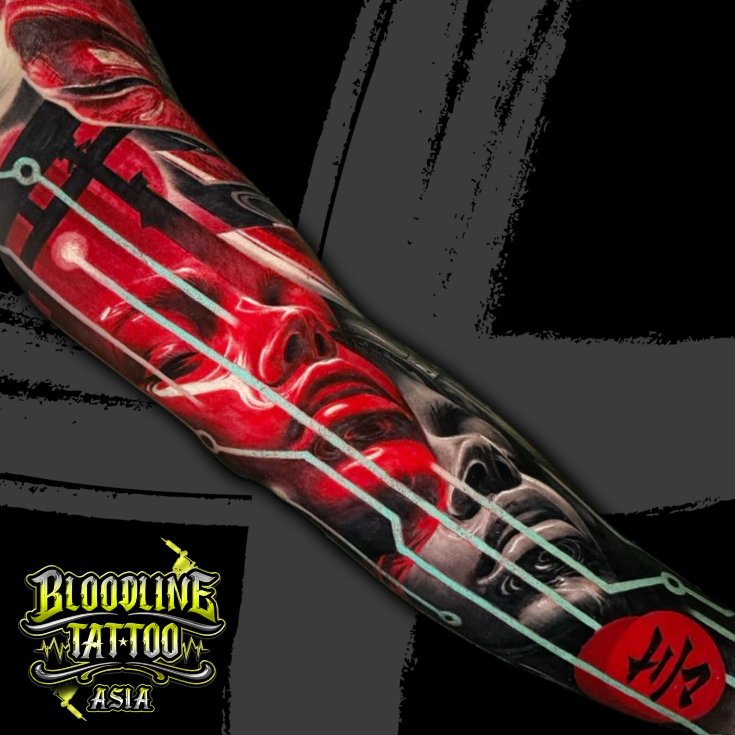 Colour surreal cyberpunk forearm sleeve tattoo with a glossy red face, grayscale portrait, and glowing blue circuit lines at Bloodline Tattoo Bali.